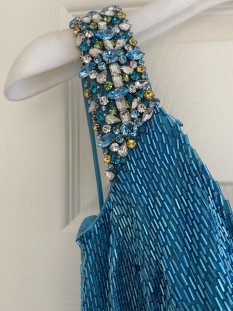 Turquoise liquid beading Jovani couture gown