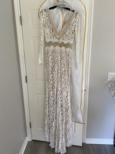 Ivory lace gown by Angela and Alison