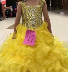  Yellow long dress with corset back size 6 (  little girls) could fit up to a size 8
